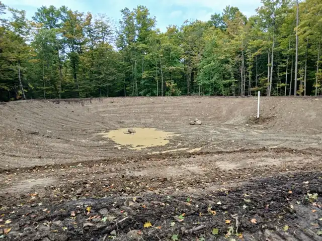 Rough-graded lot prepared for a new septic system and house construction